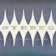 Close up of a vintage jukebox with the text stereo in metal